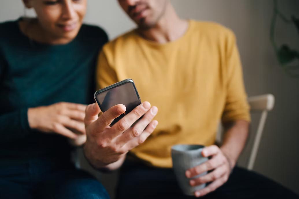 couple with phone
